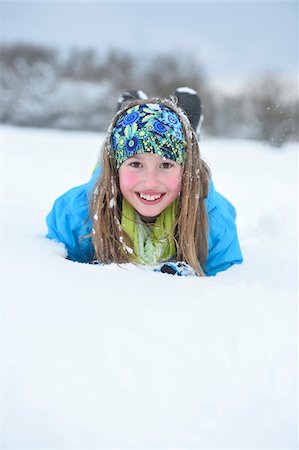 Girl Playing Outdoors in Snow, Upper Palatinate, Bavaria, Germany Stock Photo - Rights-Managed, Code: 700-08002289