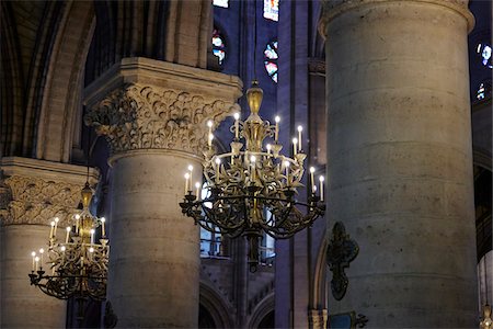 Chandeliers and Pillars inside Notre Dame Cathedral, Paris, France Photographie de stock - Rights-Managed, Code: 700-08059891