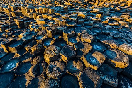 roca volcánica - Basalt Columns at Giant's Causeway, near Bushmills, County Antrim, Northern Ireland, United Kingdom Foto de stock - Con derechos protegidos, Código: 700-08146159