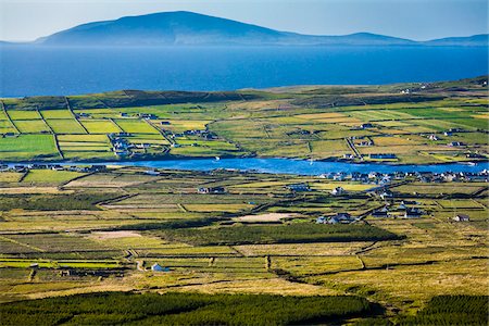 europe farm village - Scenic overview of farmland, Portmagee, along the Skellig Coast on the Ring of Kerry, County Kerry, Ireland Stock Photo - Rights-Managed, Code: 700-08146395