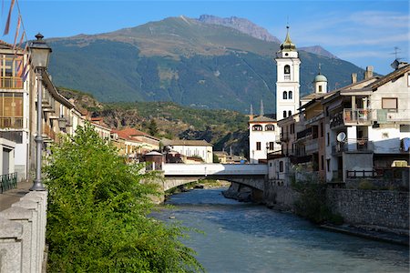 Susa's city centre with Chiesa del Ponte church tower on the right and bridge crossing the river Dora Riparia, Turin Province, Piedmont, Italy Stock Photo - Rights-Managed, Code: 700-08169165