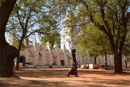 Elegant lady passing Grand Mosque of Bobo, Bobo-Dioulasso, Houet Province, Burkina Faso Stock Photo - Rights-Managed, Code: 700-08169176