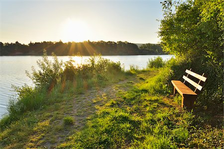 placid lake - Pathway along Shoreline at Sunrise with Bench, Niedernberg, Miltenberg-District, Churfranken, Franconia, Bavaria, Germany Stock Photo - Rights-Managed, Code: 700-08225312