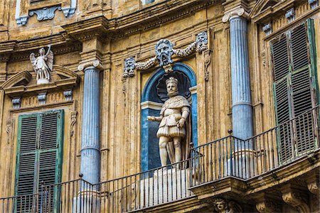 simsearch:700-06009157,k - Statue of Philip IV on the North building at Piazza Vigliena (Quattro Canti) on Corso Vittorio Emanuele in the historic center of Palermo in Sicily, Italy Stock Photo - Rights-Managed, Code: 700-08701895