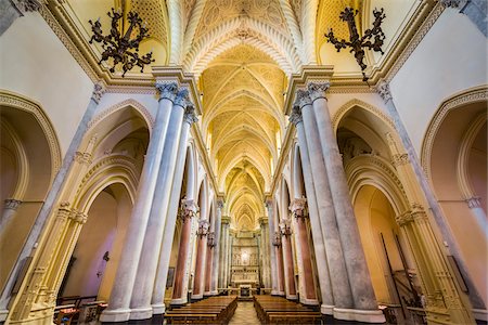 simsearch:700-06465564,k - Architectural interior showing the main aisle lined with pilars in the elegant Royal Cathedral (Real Duomo) in historic Erice in Sicily, Italy Stock Photo - Rights-Managed, Code: 700-08701950