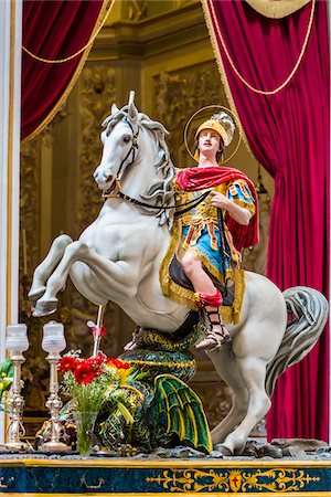 simsearch:700-08739604,k - Statue of St George on a white horse in the Cathedral of Saint George (Duomo di San Giorgio) in Ragusa in Sicily, Italy Stock Photo - Rights-Managed, Code: 700-08723106