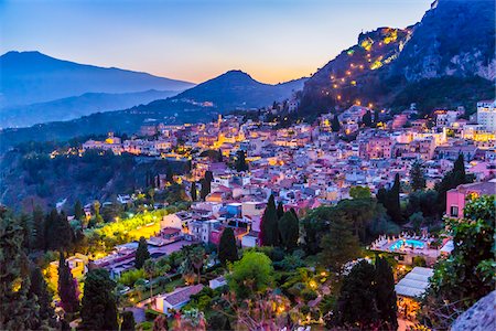 Overview of Taormina at Dusk with Mount Etna in the background, Sicily, Italy Stock Photo - Rights-Managed, Code: 700-08723314