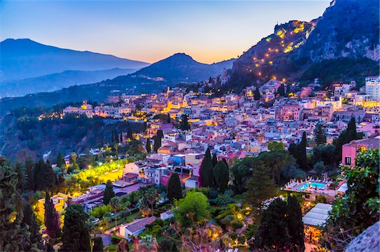 Overview of Taormina at Dusk with Mount Etna in the background, Sicily, Italy Stock Photo - Premium Rights-Managed, Artist: R. Ian Lloyd, Image code: 700-08723314