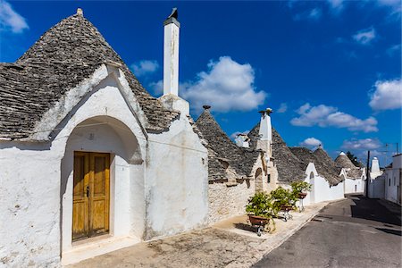 Street with Trulli Houses in Alberobello, Puglia, Italy Stock Photo - Rights-Managed, Code: 700-08739722