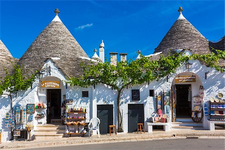 photographs of buildings in italy - Shops in Trulli Houses in Alberobello, Puglia, Italy Stock Photo - Rights-Managed, Code: 700-08739730