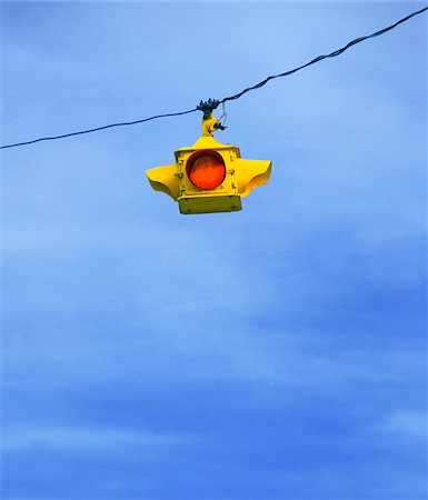 simsearch:700-08743685,k - Red traffic light hanging against blue sky, USA Stock Photo - Rights-Managed, Code: 700-08743685