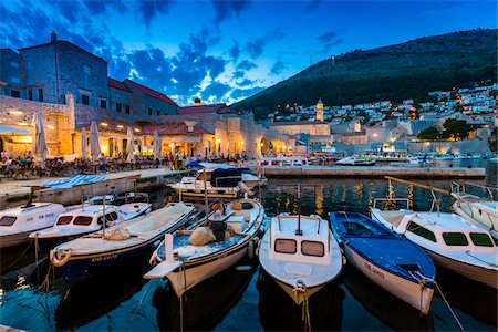 Boats in harbour at Dusk in Dubrovnik, Dalmatia, Croatia Stock Photo - Rights-Managed, Code: 700-08765330