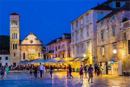 dine out - People sightseeing in St Stephen's Square with restaurant and Cahtedral of St Stephen in background in Old Town of Hvar on Hvar Island, Croatia Stock Photo - Rights-Managed, Code: 700-08765420