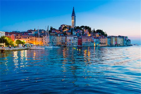 peace tower - Waterfront and skyline illuminated at dusk at the fishing port city of Rovinj in the north Adriatic Sea in Istria, Croatia Stock Photo - Rights-Managed, Code: 700-08765534