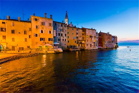 Waterfront and buildings at sunset at the fishing port city of Rovinj in the north Adriatic Sea in Istria, Croatia Stock Photo - Rights-Managed, Code: 700-08765535