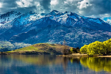 simsearch:700-00524744,k - Shoreline of lake and mountain range at Glendhu Bay in the Otago Region of New Zealand Foto de stock - Con derechos protegidos, Código: 700-08765549