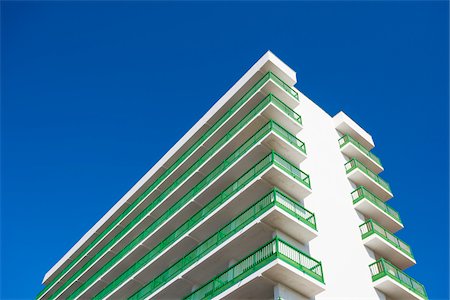 Upper section of hotel with balconies in Puerto de la Cruz on Tenerife in the Canary Islands, Spain Stock Photo - Rights-Managed, Code: 700-08783026