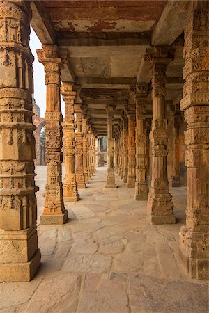 photographs of ancient india - Cloister columns of the Quwwat-ul-Islam Mosque at the Qutab Complex next to the Qutab Minar in Delhi, India Stock Photo - Rights-Managed, Code: 700-08783021