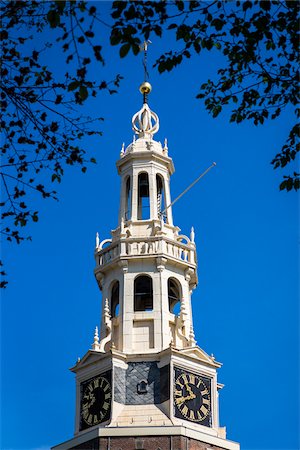 simsearch:700-03638966,k - Top section of the Montelbaanstoren tower along the Oudeschans Canal in Amsterdam, Holland Stock Photo - Rights-Managed, Code: 700-08973517