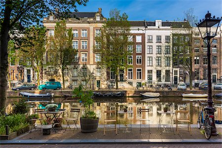 A shady sitting area along the Herengracht Canal in Grachtengordel in Amsterdam, Holland Stock Photo - Rights-Managed, Code: 700-08973510