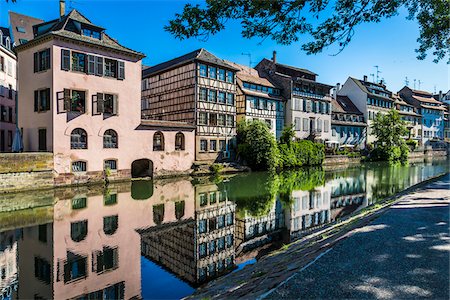 Traditional half-timber houses along the River Ill at Petite France in Strasbourg, France Stock Photo - Rights-Managed, Code: 700-08973548