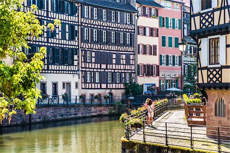 Half-timber buildings and patio along the River Ill at Petite France in Strasbourg, France Stock Photo - Rights-Managed, Code: 700-08973553