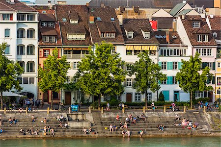 riverwalk - People sitting on steps along the seawall of the Rhine River in Basel, Switzerland Foto de stock - Con derechos protegidos, Código: 700-08986128