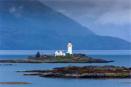 Ornsay Lighthouse with low hanging clouds on the Isle of Skye in Scotland, United Kingdom Foto de stock - Con derechos protegidos, Código: 700-08986316