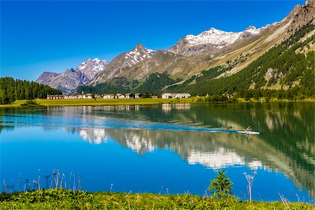 simsearch:649-06433164,k - Boating on Lake Silvaplana on a sunny day with the village of Sivaplana and the Swiss Alps in the background near St Moritz, Switzerland Stock Photo - Rights-Managed, Code: 700-08986403