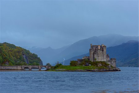 fortified castle - Eilean Donan Castle on a foggy day near Kyle of Lochalsh in Scotland, United Kingdom Stock Photo - Rights-Managed, Code: 700-08986523