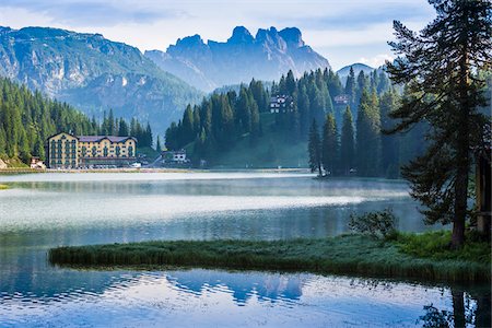 simsearch:841-06449529,k - Grand Hotel Misurina with mist over Lake Misurina with the majestic mountain tops of the Dolomites in the background near Cortina d'Ampezzo, Italy Stock Photo - Rights-Managed, Code: 700-08986612