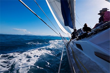 simsearch:700-09052906,k - Group of people on a sailboat, sailing on the choppy waters around the Whitsunday Islands in Queensland, Australia Photographie de stock - Rights-Managed, Code: 700-09025292