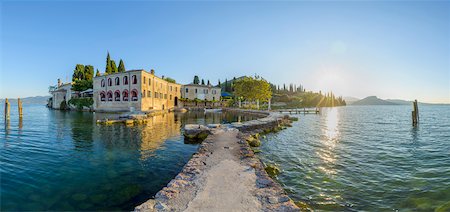 dock, not person - Locanda San Vigilio with harbor at sunrise in Punta San Vigilio in Garda on Lake Garda in Veneto, Italy Stock Photo - Rights-Managed, Code: 700-09022539