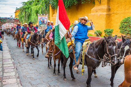 simsearch:700-03466713,k - Horesback riders parade to the Parroquia de San Miguel Arcangel at the St Michael Archangel Festival in San Miguel de Allende, Mexico Stock Photo - Rights-Managed, Code: 700-09088045