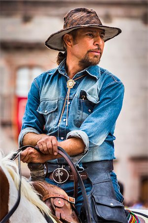 simsearch:700-09088193,k - Mexican man on horseback participating in the historic horseback parade celebrating Mexican Independence Day, San Miguel de Allende, Mexico. Stock Photo - Rights-Managed, Code: 700-09088199