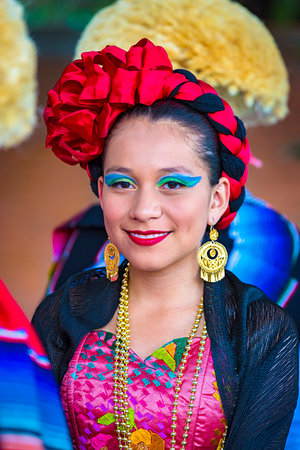 simsearch:700-02694233,k - Portrait of young woman in traditional dress in the St Michael Archangel Procession, in San Miguel de Allende, Mexico Stock Photo - Rights-Managed, Code: 700-09227000