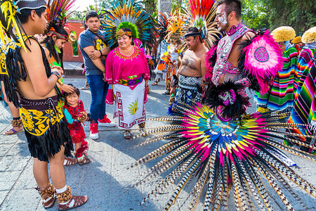 fiesta de san miguel arcangel - Group of indigenous tribal dancers at a St Michael Archangel Festival parade in San Miguel de Allende, Mexico Stock Photo - Rights-Managed, Code: 700-09227013