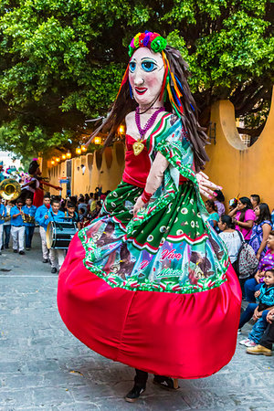 Mohiganga puppet and marching band at a St Michael Archangel Festival parade in San Miguel de Allende, Mexico Stock Photo - Rights-Managed, Code: 700-09227024