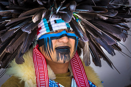 simsearch:700-09227109,k - Close-up portrait of an indigenous tribal dancer at a St Michael Archangel Festival parade in San Miguel de Allende, Mexico Stockbilder - Lizenzpflichtiges, Bildnummer: 700-09227034