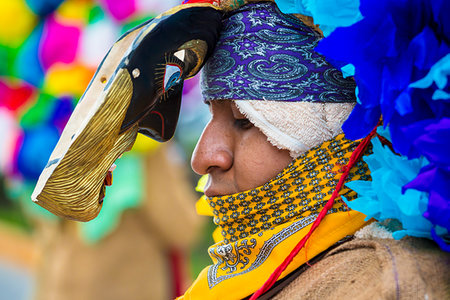 simsearch:841-07523440,k - Close-up of an indigenous tribal dancer at a St Michael Archangel Festival parade in San Miguel de Allende, Mexico Fotografie stock - Rights-Managed, Codice: 700-09227048