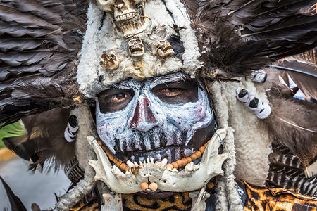 feathered headdress dancer - Close-up of an indigenous tribal dancer at a St Michael Archangel Festival parade in San Miguel de Allende, Mexico Stock Photo - Rights-Managed, Code: 700-09227074