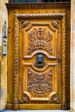 simsearch:700-09236798,k - Close-up of ornate wooden door in Aix-en-Provence, Provence-Alpes-Cote d'Azur, Provence, France. Stock Photo - Rights-Managed, Code: 700-09236704