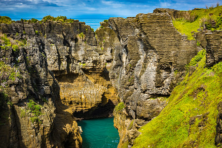 punakaiki rocks - The Pancake Rocks at Dolomite Point near Punakaiki on the West Coast of the South Island of New Zealand, between Westport and Greymouth, New Zealand. Photographie de stock - Rights-Managed, Code: 700-09237280