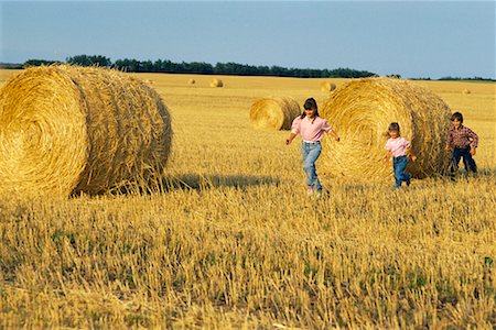 Children Playing near Hay Bales Hamiota, Manitoba, Canada Stock Photo - Rights-Managed, Code: 700-00006860