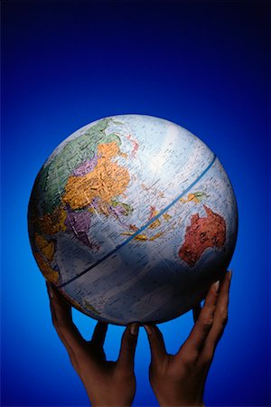 Hands Holding Globe Pacific Rim Stock Photo - Rights-Managed, Code: 700-00008694
