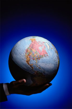 free trade - Hand Holding Globe North America Fotografie stock - Rights-Managed, Codice: 700-00008692