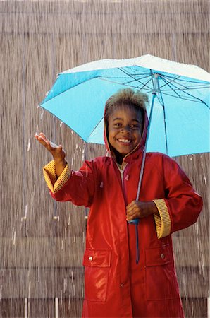 rain little girl - Jeune fille debout sous la pluie Photographie de stock - Rights-Managed, Code: 700-00009887