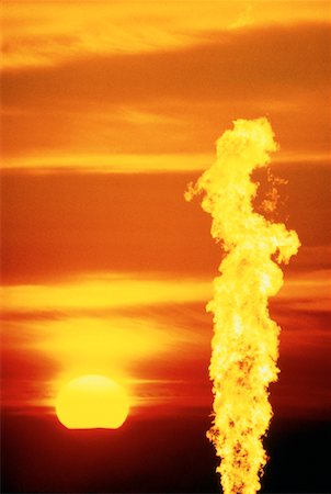 refinery at the evening - Sunset and Flame Stock Photo - Rights-Managed, Code: 700-00002504