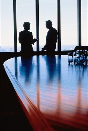 Silhouette of Businessmen in Boardroom Fotografie stock - Rights-Managed, Codice: 700-00014291