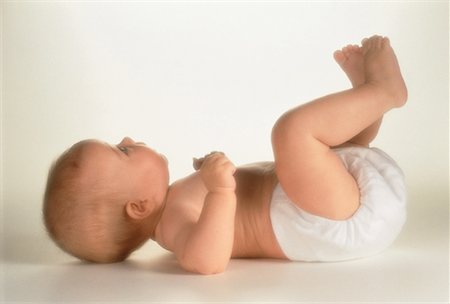 Profile of Baby Lying on Back Fotografie stock - Rights-Managed, Codice: 700-00014516